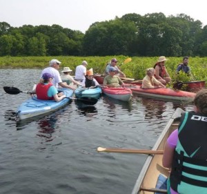 Professor Donahue talks History to Riverfest paddlers.