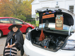 A friendly witch offering treats. credit A. Plotkin
